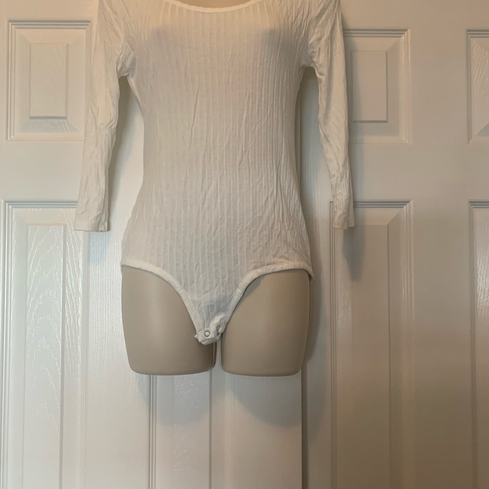 White mid-sleeve body suite size Medium
